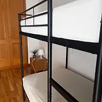 Quarto em Acomodações Particulares Ilumina